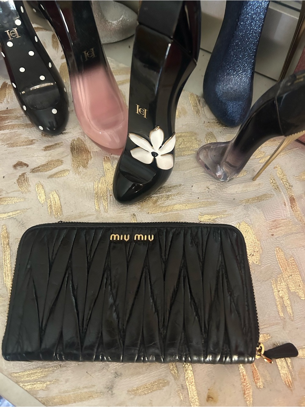 Miu Miu Black Matelassé Zip Wallet with Gold Logo
